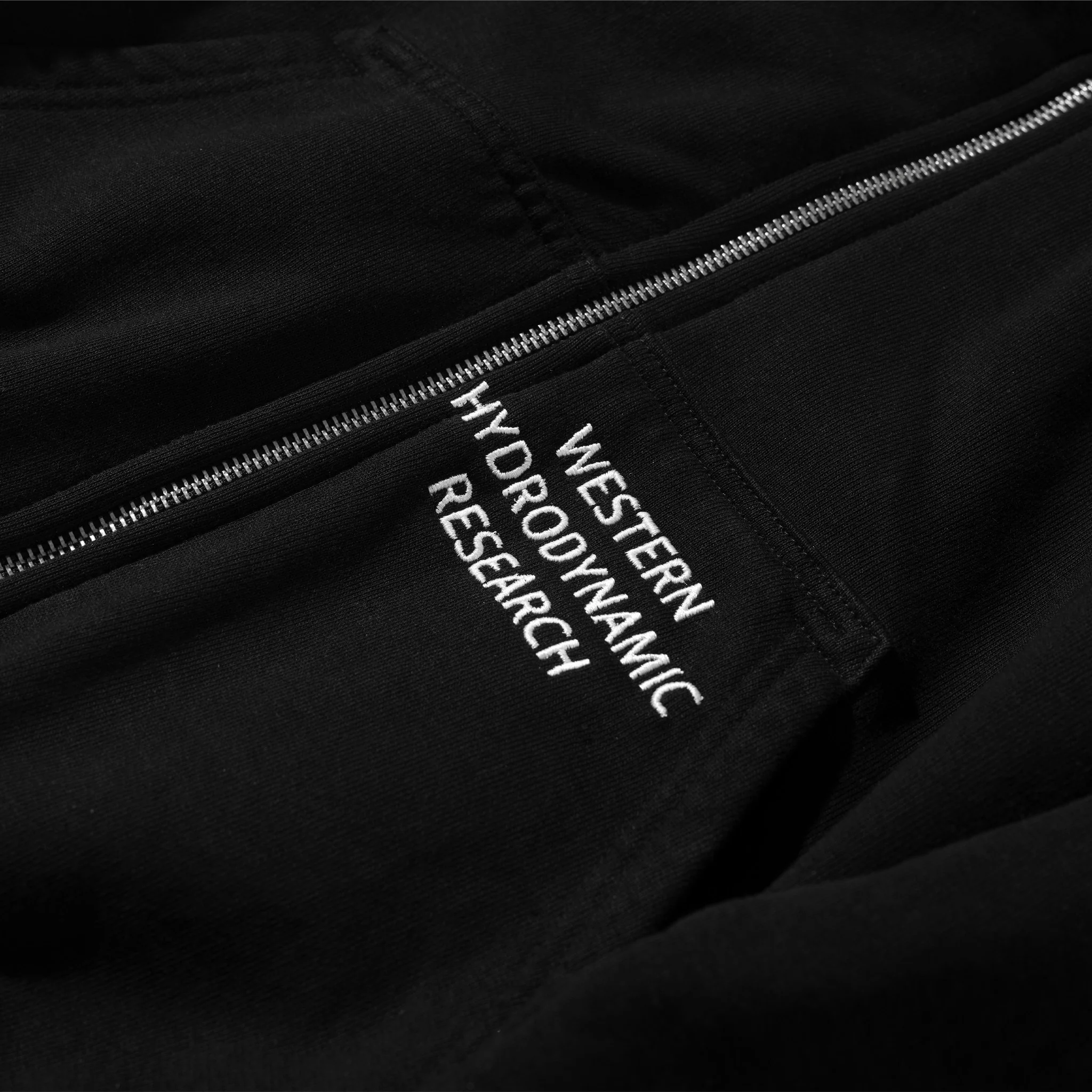 5031-western-hydrodynamic-research-zip-hoodie-black-2.webp Western Hydrodynamic Research Zip Hoodie (Black)